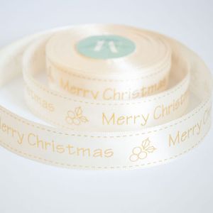 Лента атласная новогодняя "Merry Christmas ягодка" 2,5 см. 22,5м. кремовая